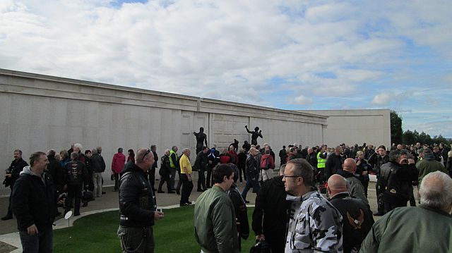 large white wall with the names of the fallen at the national memorial arboretum