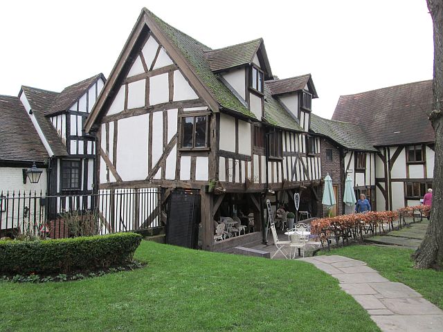 ancient looking timber framed building being used as a restaurant