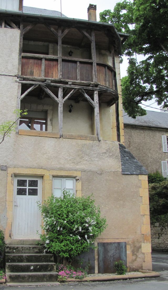 medieval timber framed balconies in a house in montignac