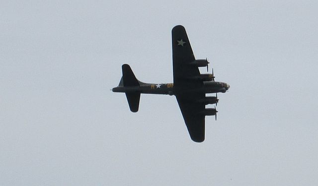 an american world war 2 bomber with 4 engines over the heritage centre