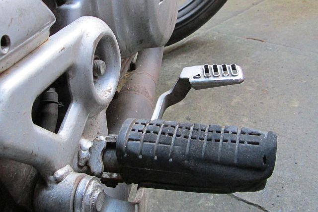 the worn peg rubber on the other side of the motorcycle