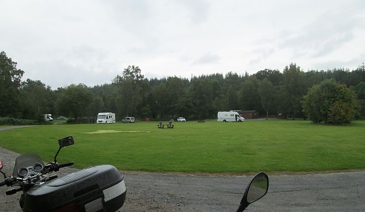 Kilvrecht Campsite, just grass some campers and a wooden toilet shower block