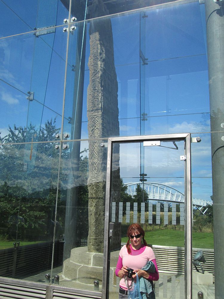the ancient stone at forres, encased in glass and the gf outside to show it's very tall