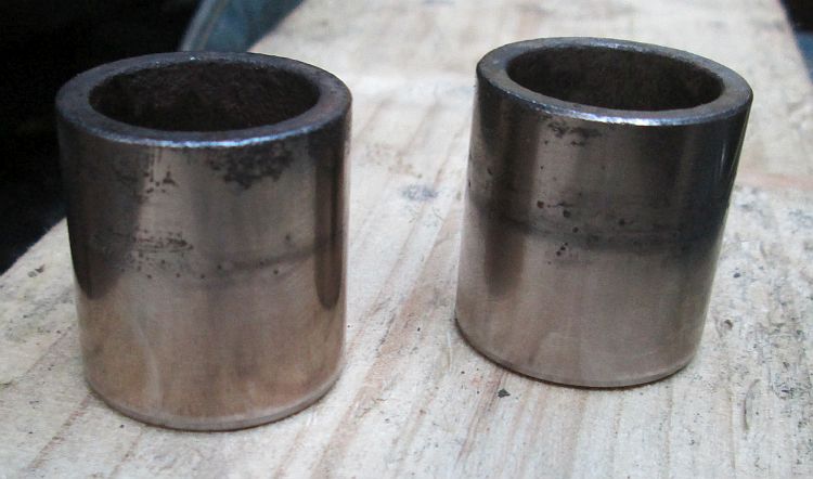 the brake pistons after being cleaned with the wire brush drill bit