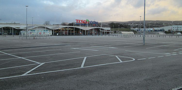 the vast empty car park and closed tesco in horwich