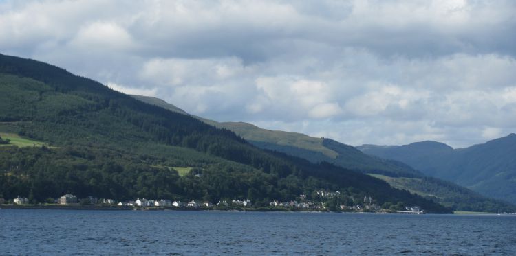 hills roll down to the shoreline as we cross the waters to dunoon