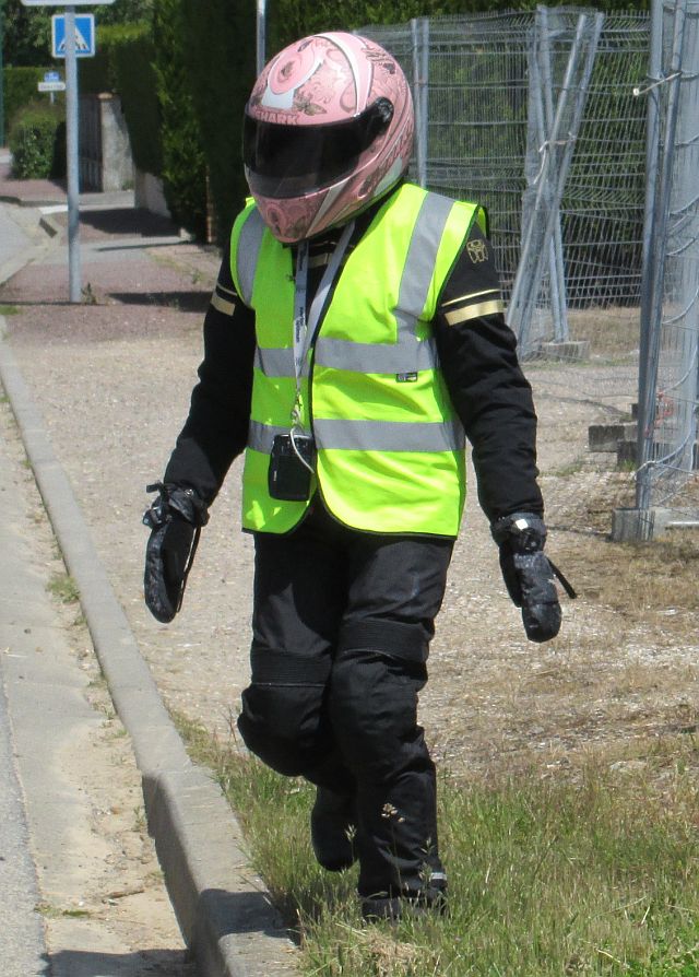sharon in full cordura motorcycle safety gear, helmet and hi-viz vest