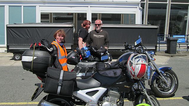 the gf and 2 motorcycles at the port in douglas, the isle of man
