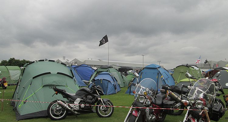 grey skies over the tents and motorcycles at the millennium rally 2014