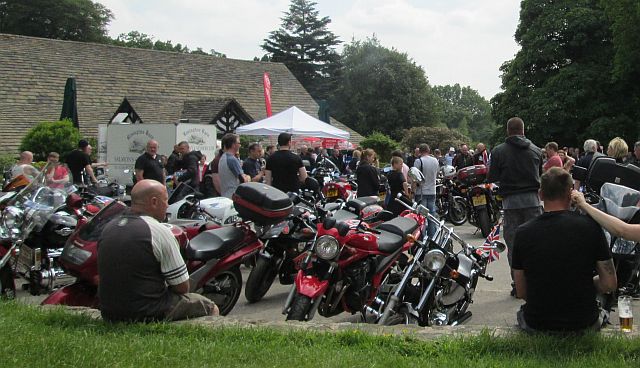 Bikers hanging out at rivington barn on a warm dry sunday