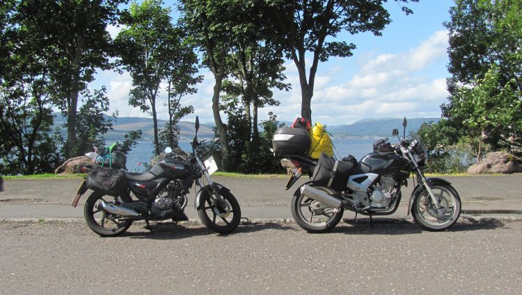 CBF 250 and RKS 125 with luggage against a mountainous Scottish vista