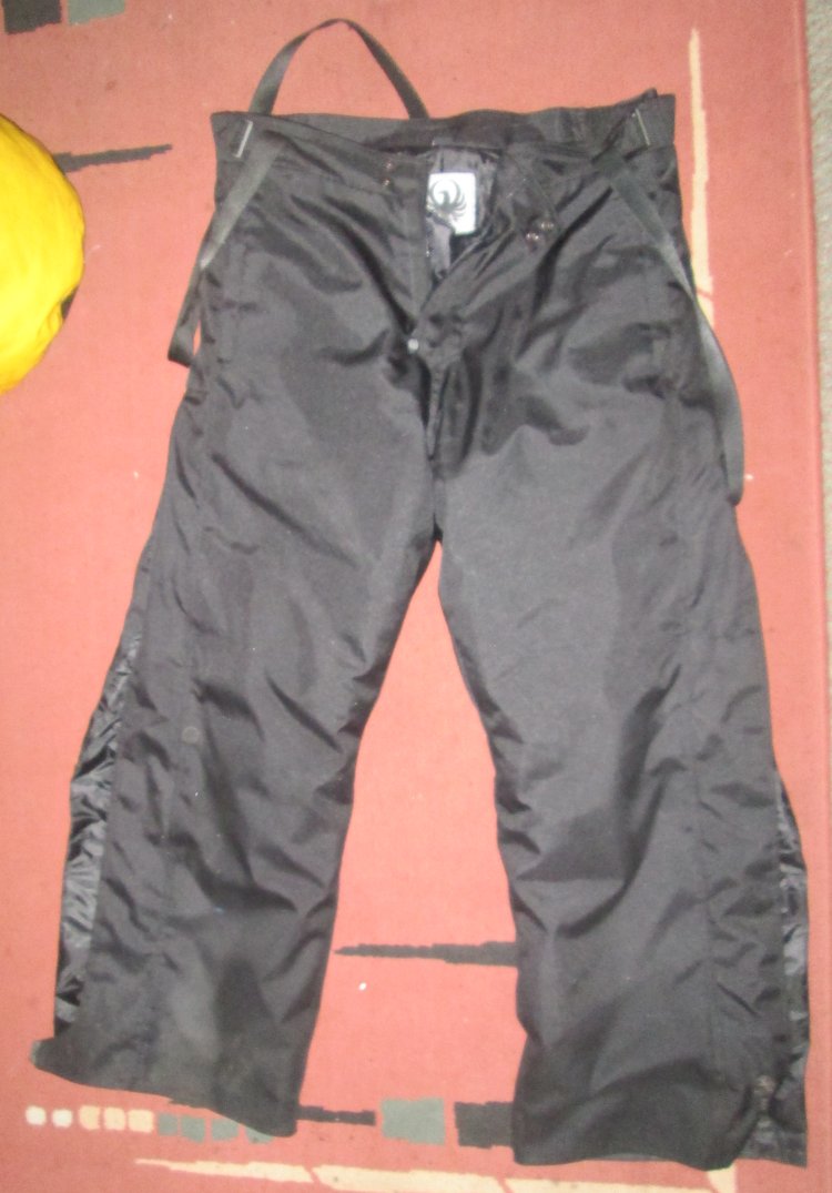 the merlin bergan overtrousers laid out on the floor