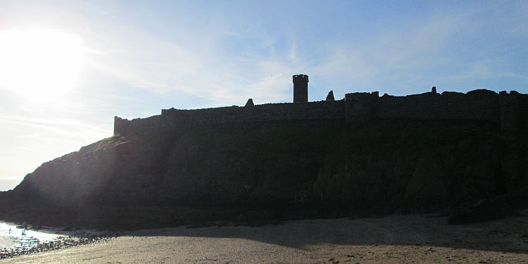 peel castle outlined in the setting sun 2014