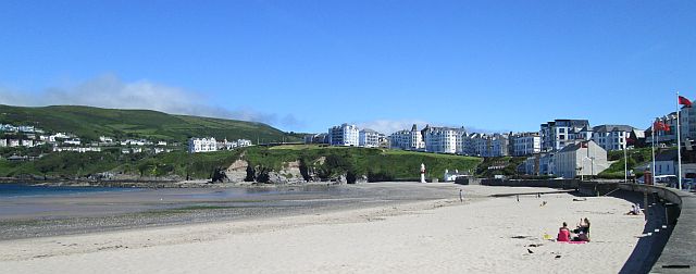 the cove at port erin. Beach in the foreground, hotels and apartments on the bluffs