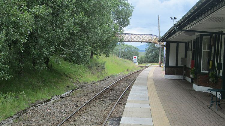 rannoch station, the walkway over the tracks, the platform and the edge of the station buildings