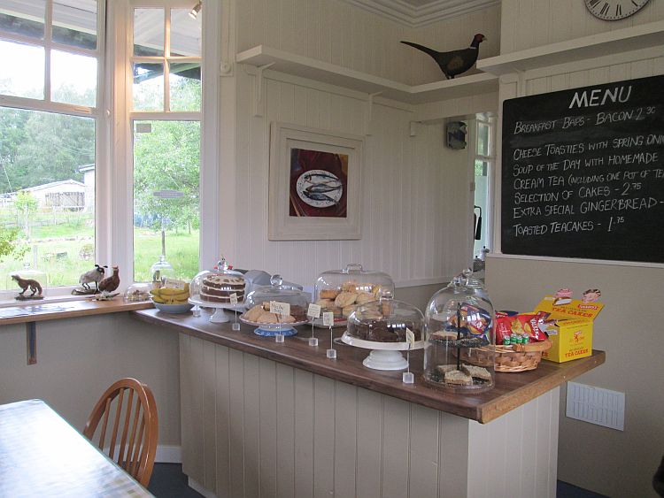 the inside of rannoch station cafe with the counter and old looks