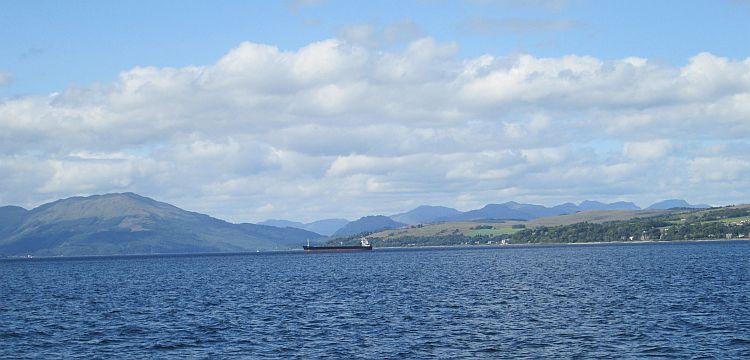 a vast open water surrounded by hills and mountains on the firth of clyde
