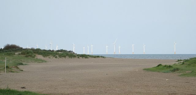 wind turbines off the coast of skegness beach