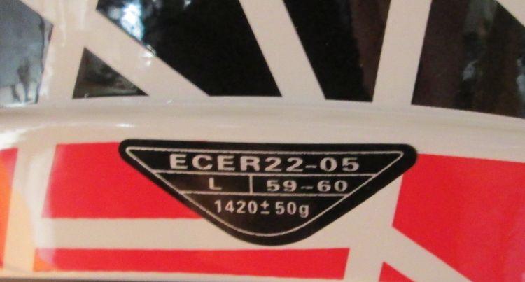the 22-05 sticker on the back of the motorcross helmet