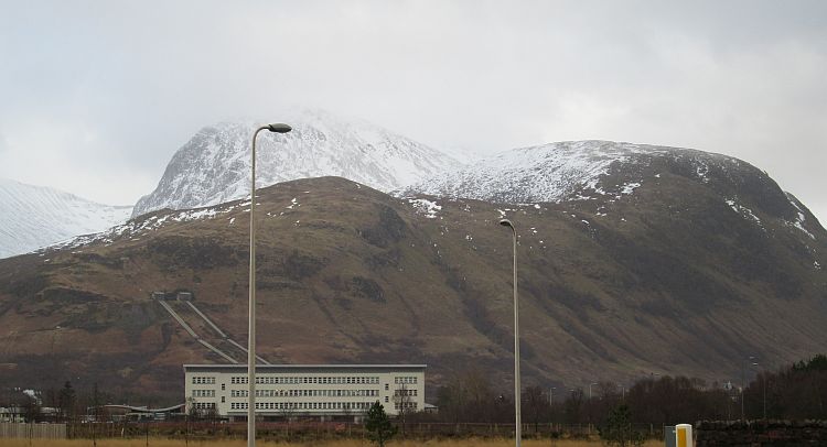 BEN NEVIS covered in winter snow and hazy mists