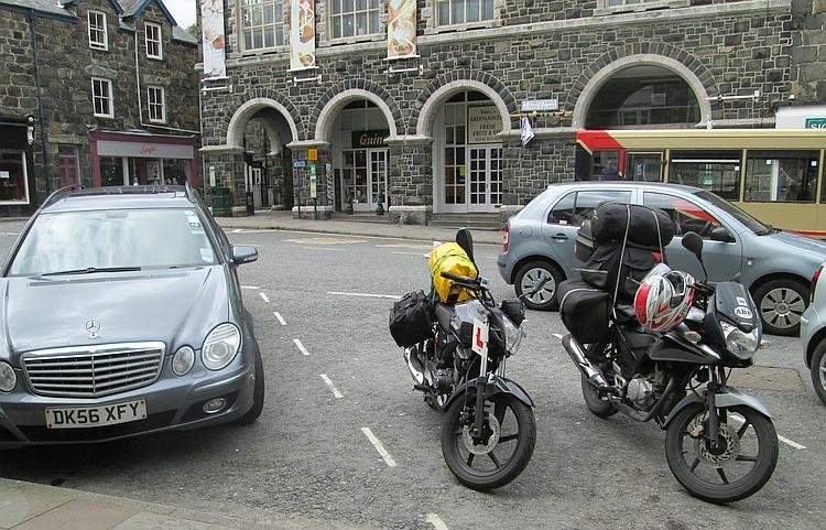 Our 2 125s loaded with camping gear in Dolgellau town centre