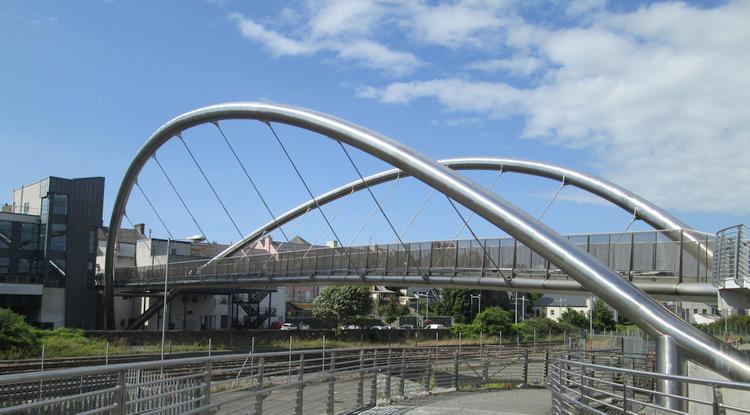 Celtic Gateway Bridge, a large stainless steel footbridge at Holyhead port