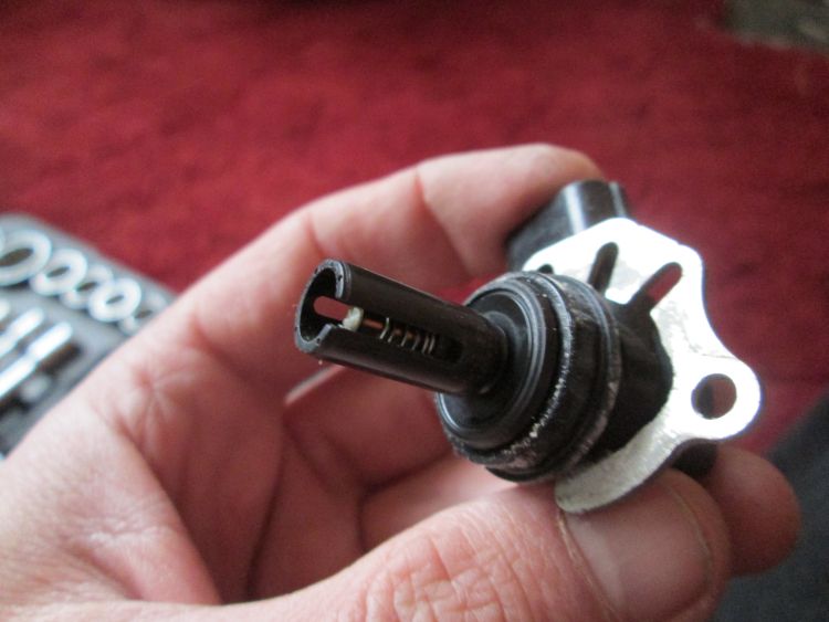 the idle air control valve. A small plastic motor with a plastic plunger