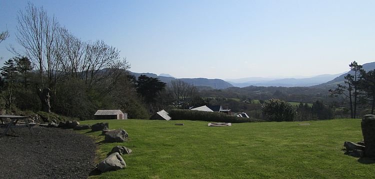 looking out across mountains and the bay from the cottage