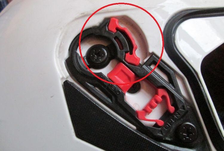 The small piece of plastic circled on the helmet's base plate