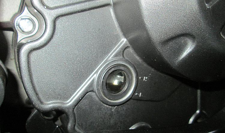 The oil sight glass or level indicator on Sharon's keeway