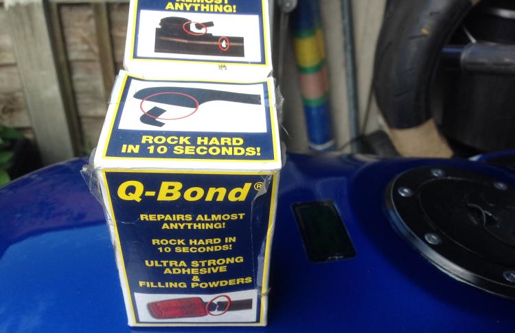A box of Q-Bond for repairing the mudguard