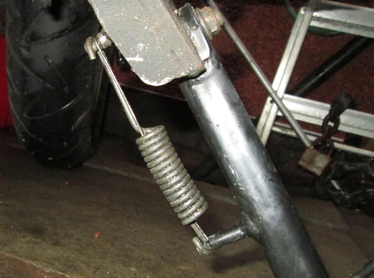 A side stand spring on the motorcycle