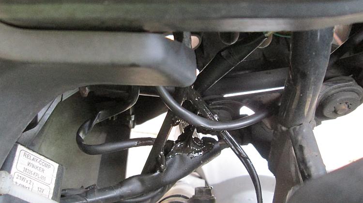 Melting wires below the speedometer on Ren's 124