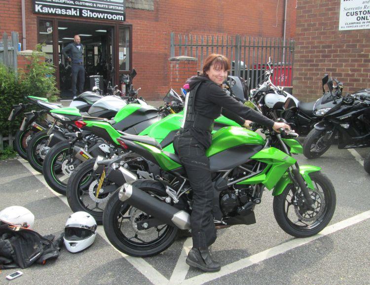 Sharon on the day she collected her Kawasaki Z250SL from Orrell Motorcycles