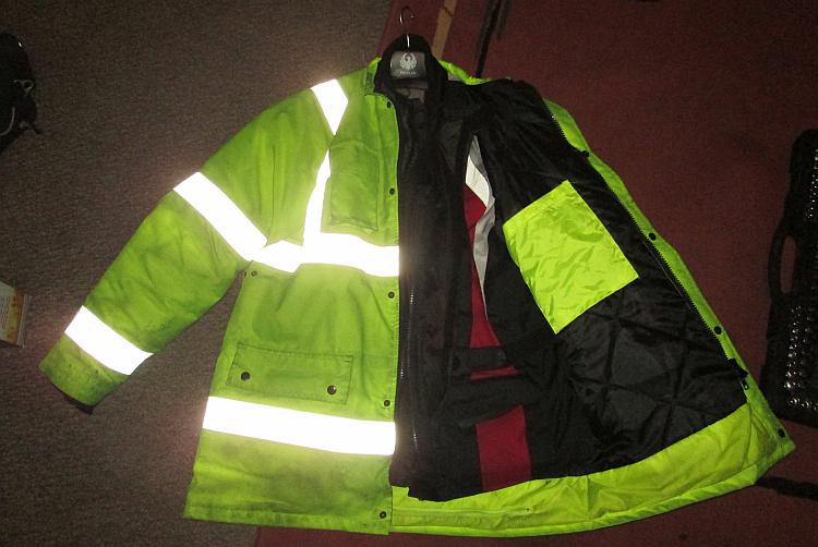 2 jackets, a big waterproof and quilted hi-viz over a regular textile motorcycle jacket