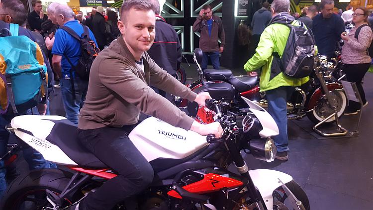 Aaron sits upon the Triumph Street Triple R 675
