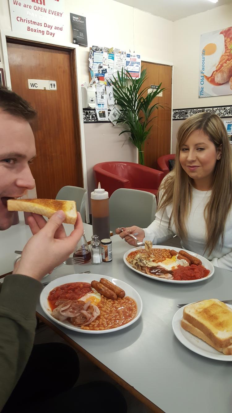Pete's daughter and her partner Aaron tuck into a hearty breakfast at truckers rest