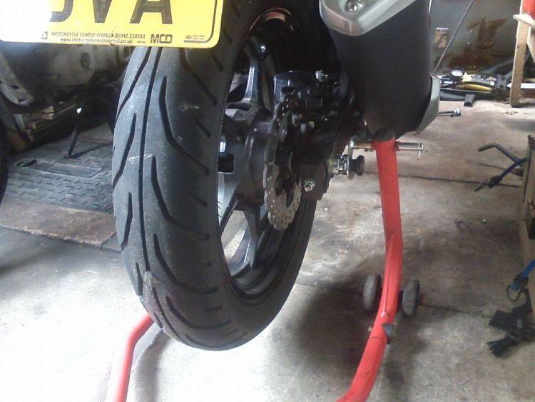 Again the 250 on the paddock stand, you can just see the puncture repair worm