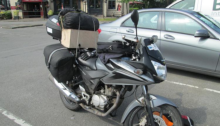 The old CBF125 and a full load of camping luggage