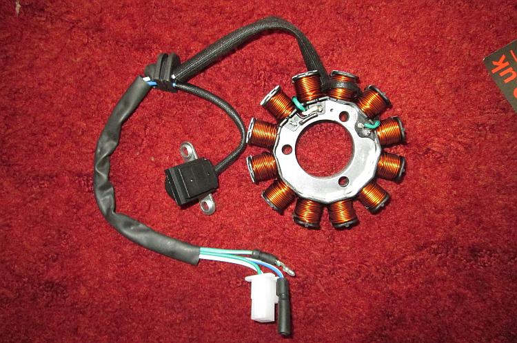 The unpacked stator and wiring. It also includes the crank position sensor or pickup