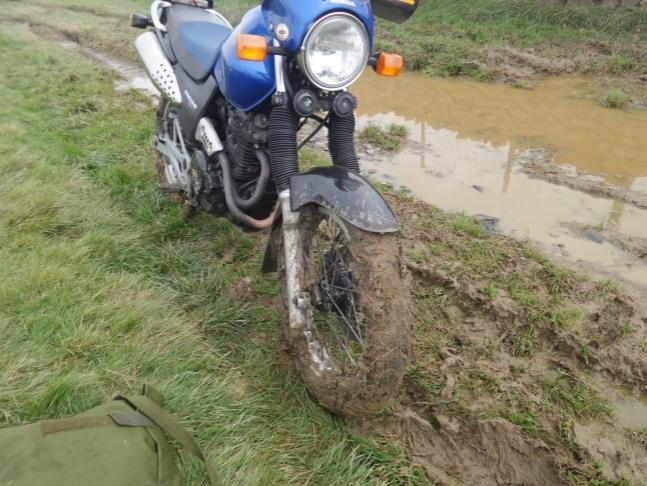 The front tyre is filled with thick claggy mud on Bob's 650