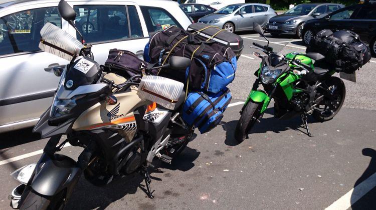 Ren and Sharon's bikes in a car park complete with all the luggage for the forthcoming trip