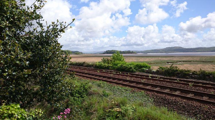 Railway lines and vast broad flat bay, looking from Grange Over Sands to Morecambe