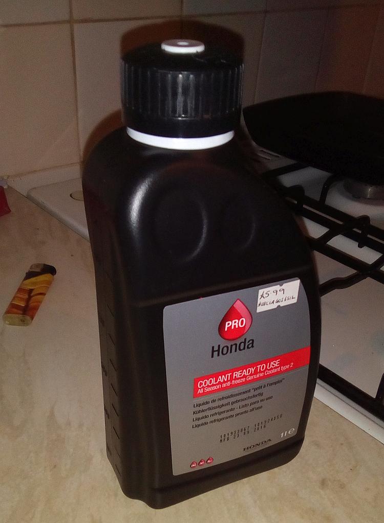 A 1 litre bottle of honda pro coolant
