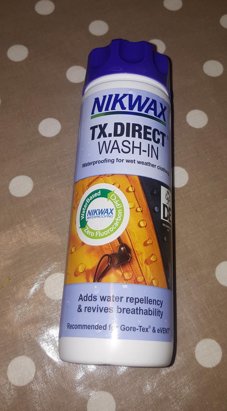 A tin of the Nikwax on a table