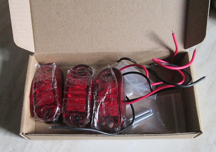 The pack containing 3 of the 4 red LED running lights