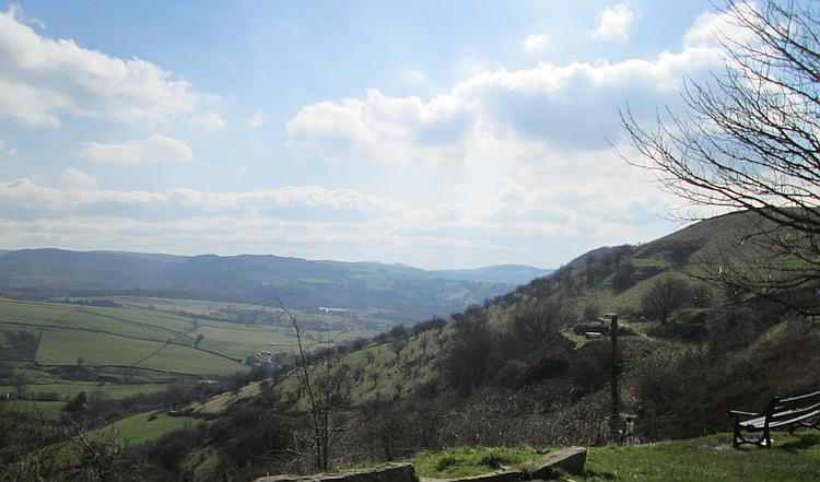 Teggs Nose near Matlock, looking out over green valleys on a bright clear day