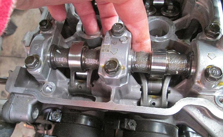 Inside the cylinder head of the CB500x are the tappets, followers and valves