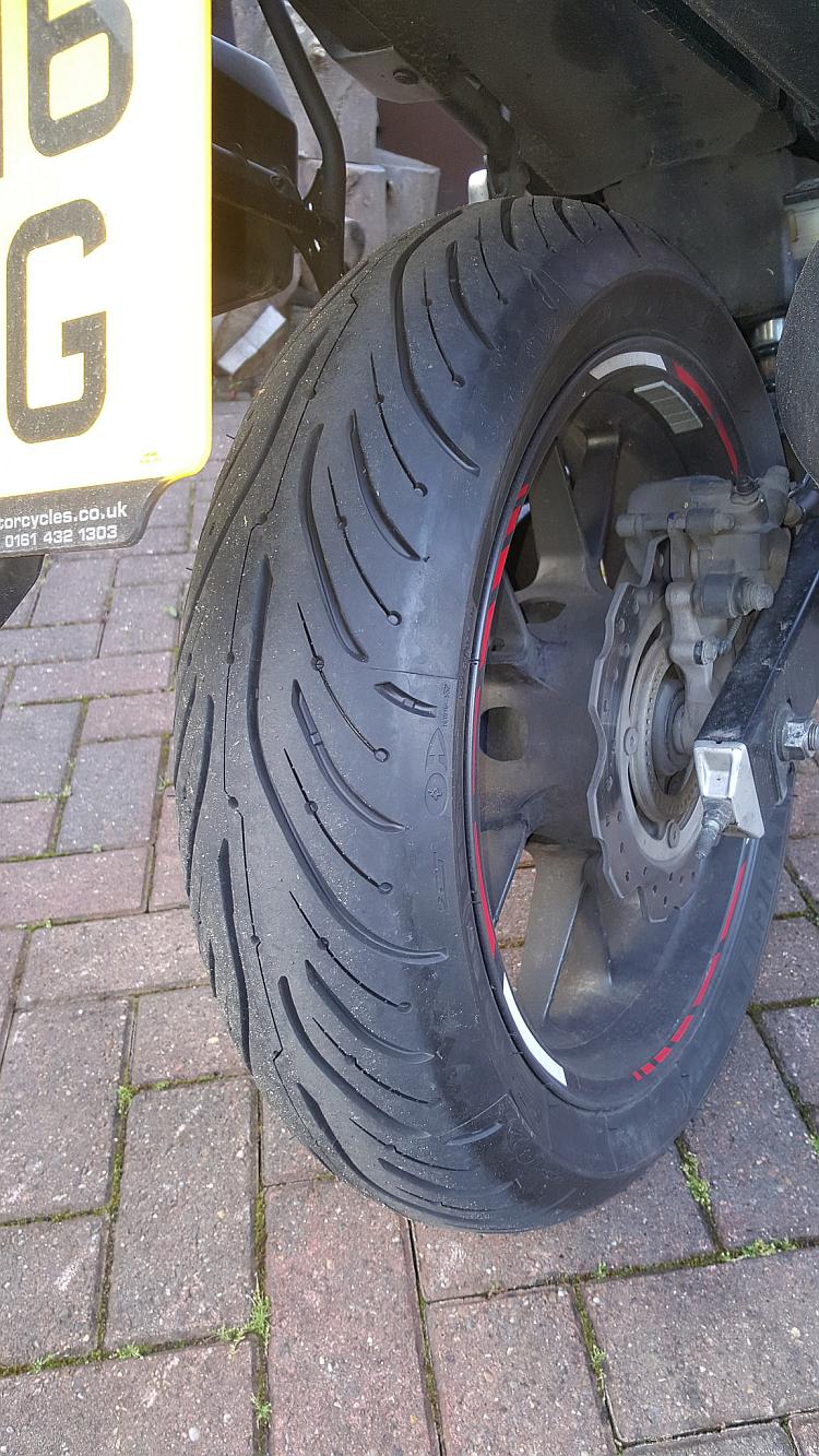 Pete's own tyre and wheel refitted to his bike by himself