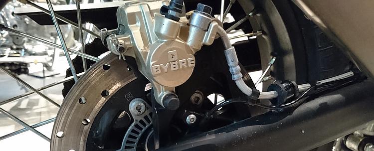 The rear brake on the Himalayan is marked Byrbe
